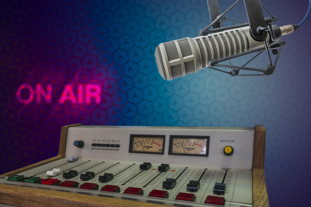 Professional microphone and audio mixer in radio studio